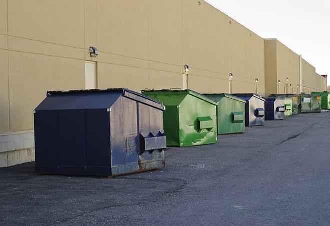 big yellow dumpsters on a construction lot in Brielle NJ